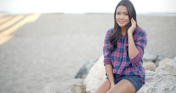 Woman with long hair on summer beach — Stock Photo, Image