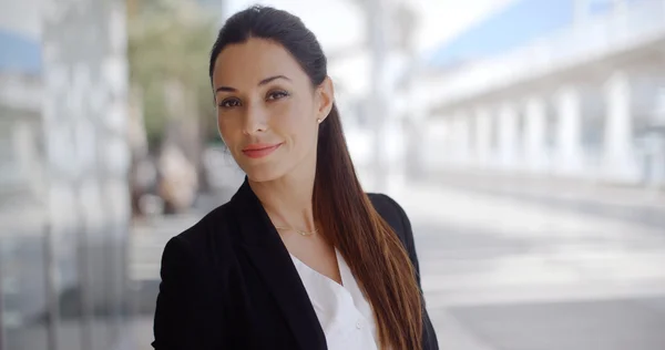 Businesswoman looking at camera — Stock Photo, Image