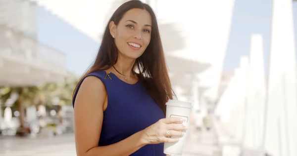 Woman holding large cup of coffee — Zdjęcie stockowe