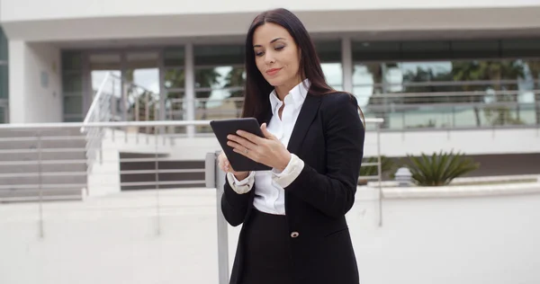 Stylish businesswoman using tablet computer — Stock Fotó