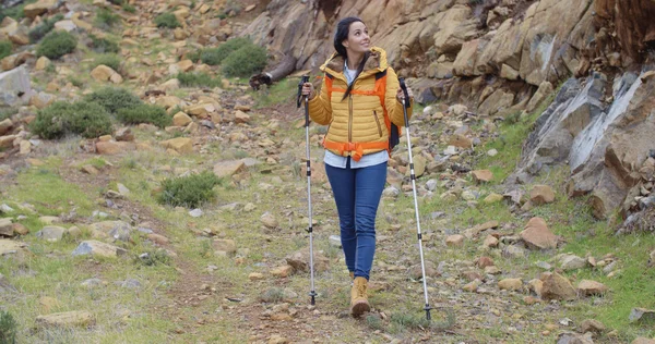 Fit healthy young woman hiking on a trail — 스톡 사진