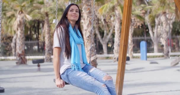 Woman having fun on swing — Stock Video