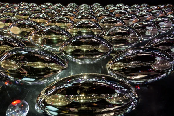 Metal laminado oval reflejado como fondo abstracto —  Fotos de Stock