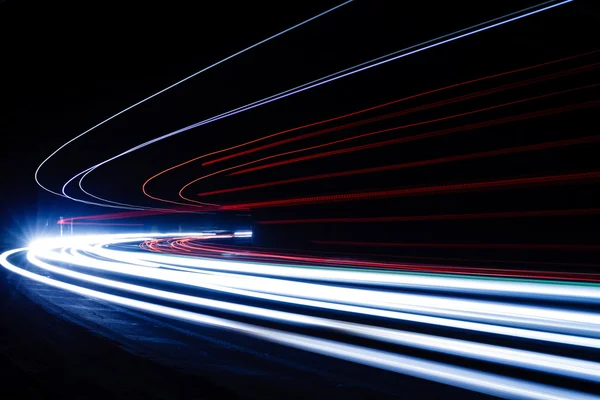 Light trails in tunnel. Art image. Long exposure photo taken in — Stock Photo, Image