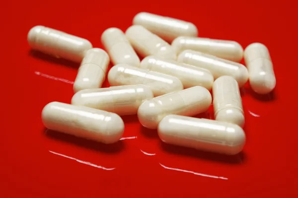 Tabletta fehér háttér — Stock Fotó