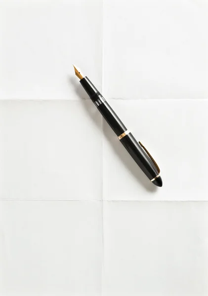 Pen and white sheet of paper — Stock Photo, Image