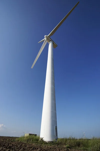 Photo of Wind power installation in sunny day — Stock Photo, Image