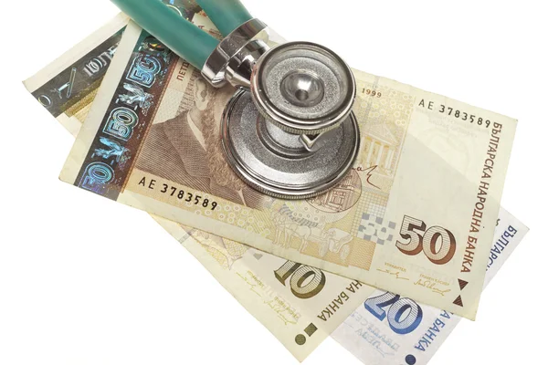 Stethoscope on the top of the money — Stock Photo, Image