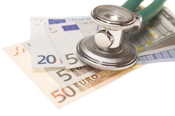 Stethoscope on the top of the money — Stock Photo, Image