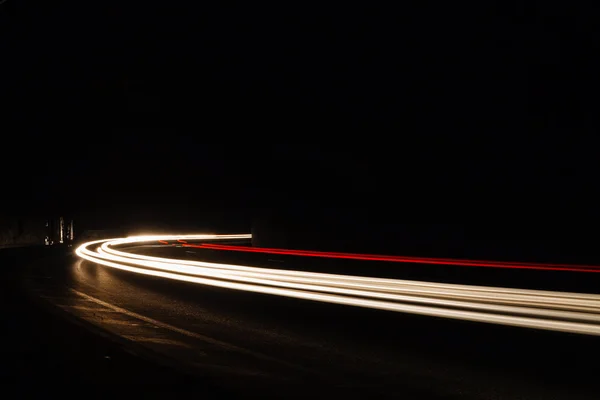 Light tralight trails in tunnel. Long exposure photo in a tunel — Stock Photo, Image