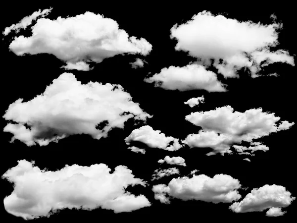 Set of isolated clouds over black. — Stock Photo, Image