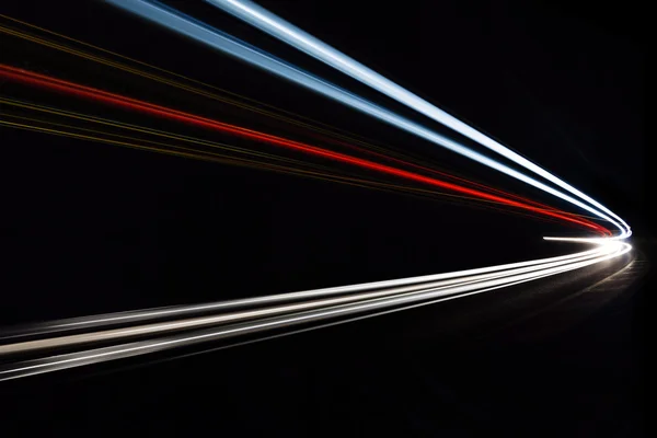 Trilhas de luz do carro no túnel . — Fotografia de Stock