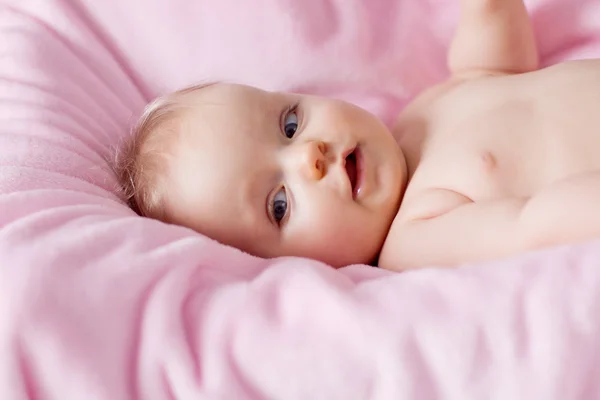 Schöne lächelnde süße Baby Stockbild
