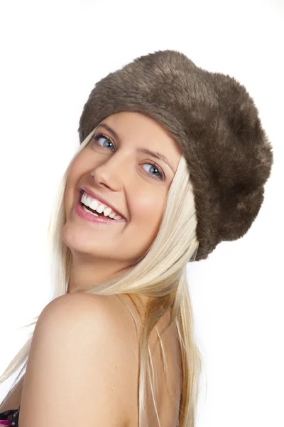 Portrait of winter woman smiling - over a white background — Stock Photo, Image