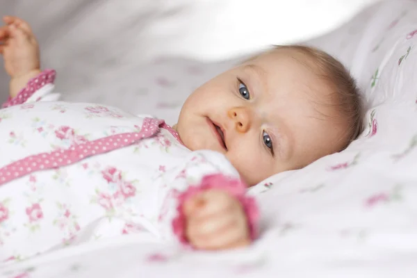 Portrait of adorable smiling newborn baby — Stock Photo, Image