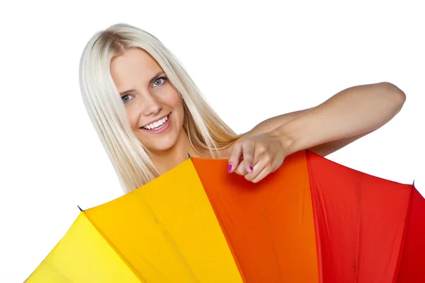 Beautiful young girl with red umbrella, isolated in white, studio shot — Stock Photo, Image