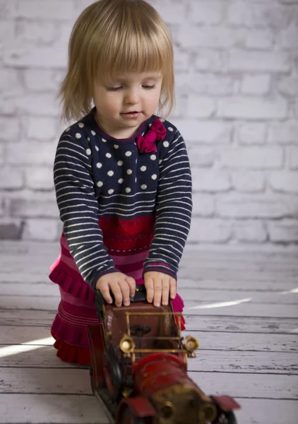 Sweet little girl at lovely dress — Stock Photo, Image