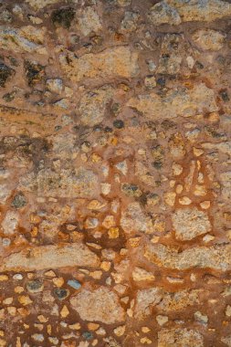 close-up of the structure of an old stone wall