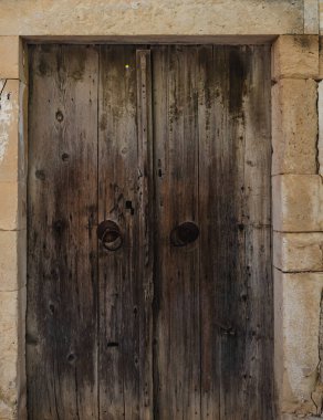 old entrance door seen from the outside of the building