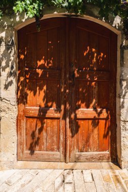 old entrance door seen from the outside of the building