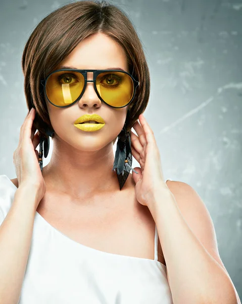 Model with yellow sunglasses Stock Image