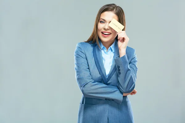 Business woman shows credit card — Stock Photo, Image
