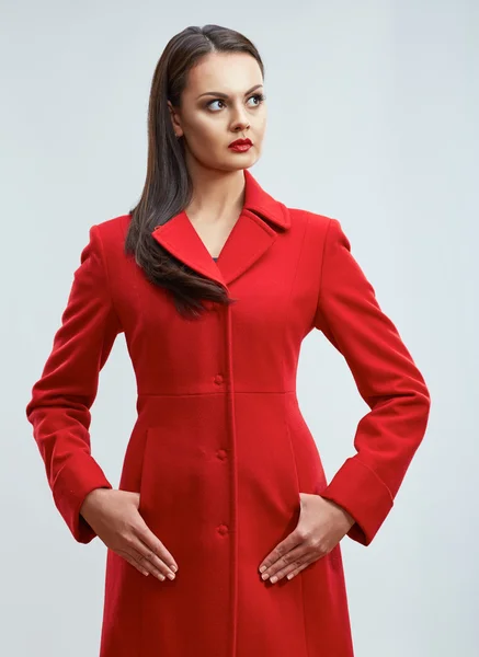 Young model in red coat — Stock Photo, Image