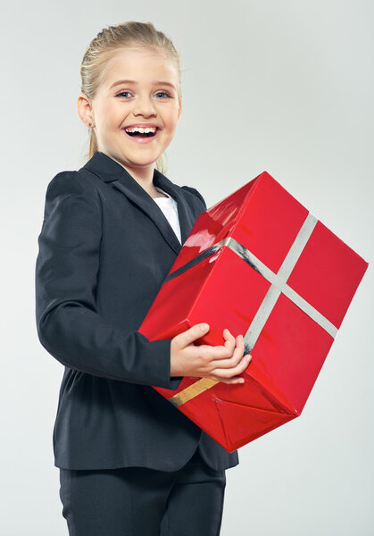 Schoolgirl hold big red gift box
