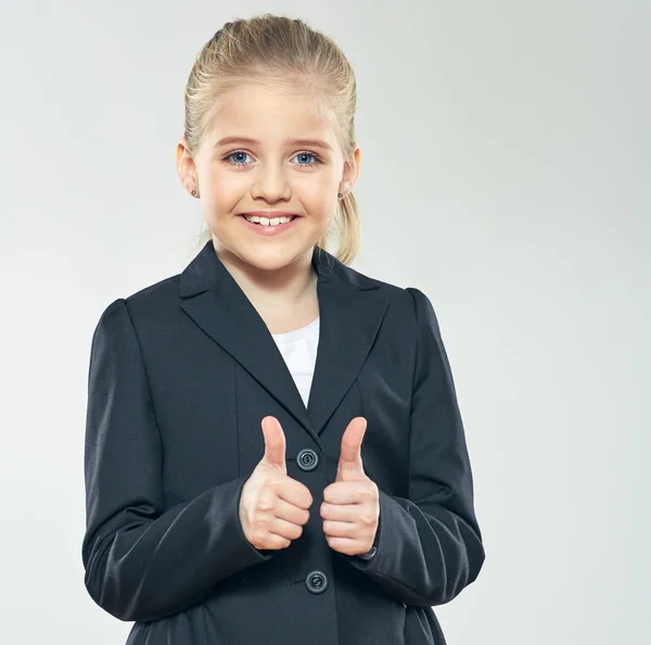 Usmívající se školačka s palec nahoru — Stock fotografie