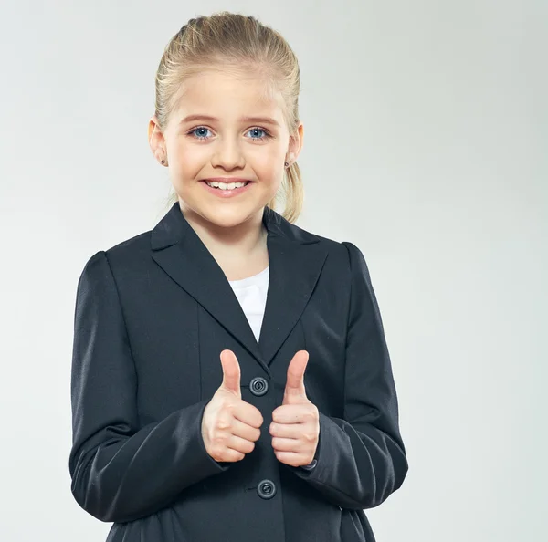 Lachende schoolmeisje met Duimschroef opwaarts — Stockfoto