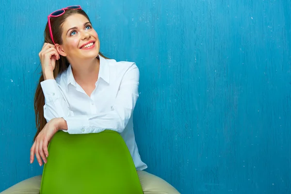 Woman sitting on chair — Stock Photo, Image