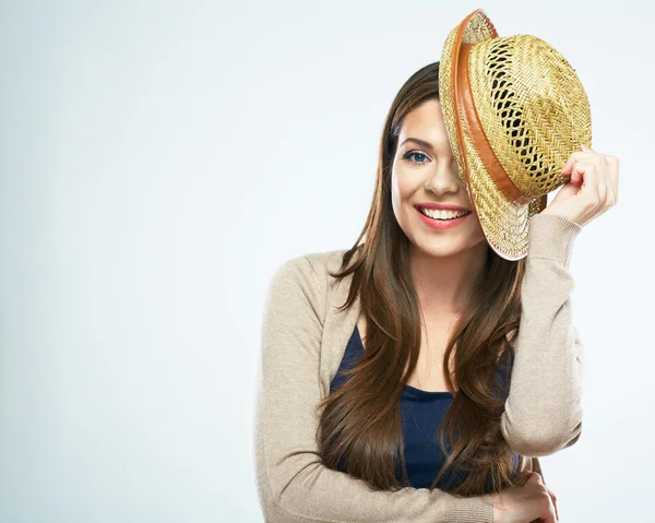 Woman touching straw hat — Stock Photo, Image