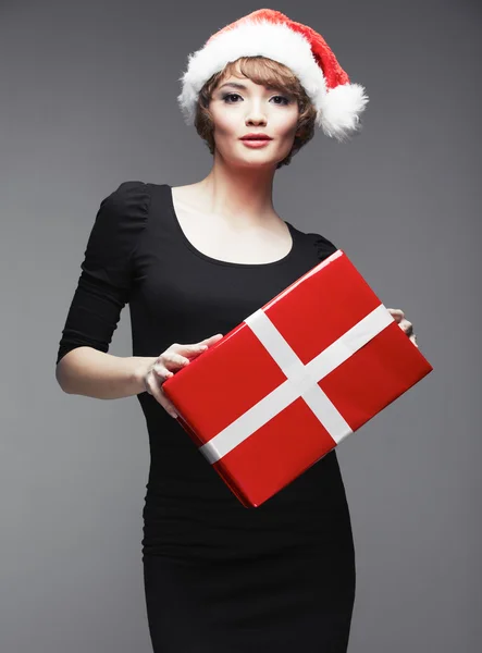 Sexy vrouw in Kerstman hoed性感的女人，在圣诞老人的帽子 — Stockfoto
