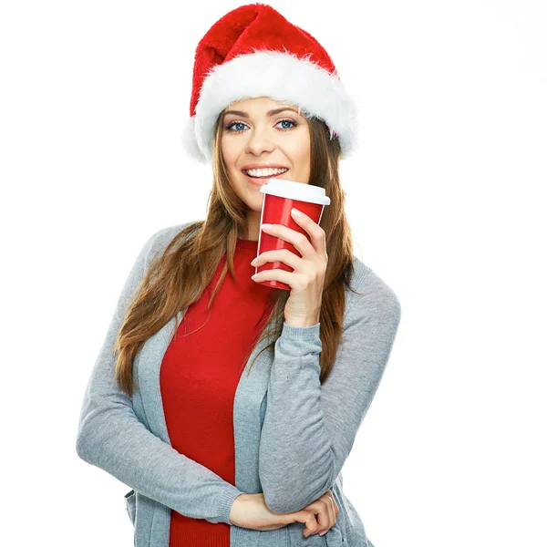 Kobieta w kapeluszu Santa z filiżanki kawy — Zdjęcie stockowe