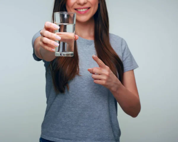 Smiling Woman Holding Water Glass Pointing Finger Half Face Isolated — Stock Photo, Image