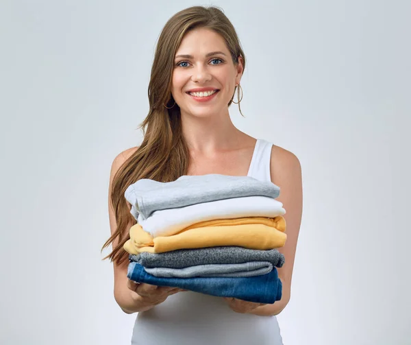 Smiling Woman Holding Stack Clothes Isolated Portrait — Stock Photo, Image