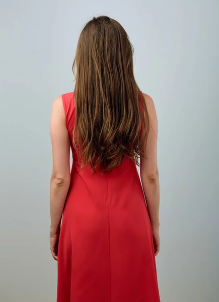 Woman Red Dress Long Hair Standing Back Isolated Female Portrait — Stock Photo, Image