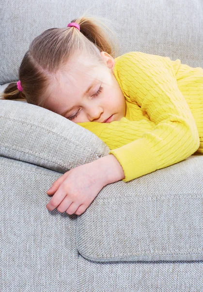 Girl sleep in a casual clothes  on sofa. — Stock Photo, Image