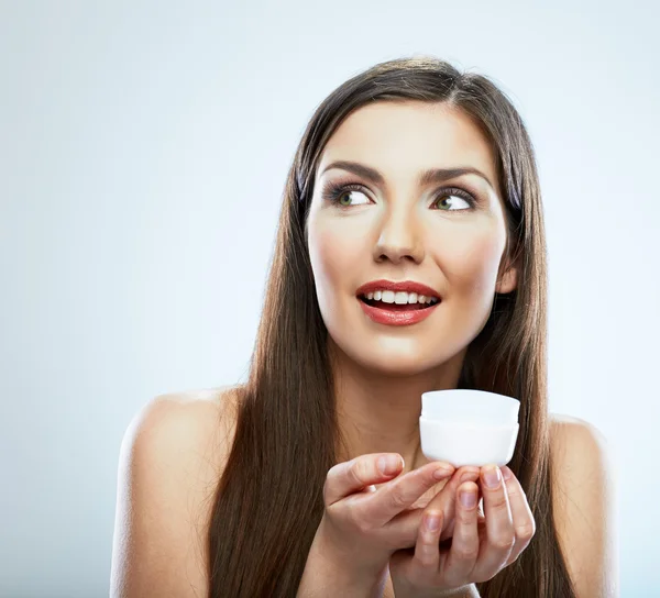 Young model hold skin care cream. — Stock Photo, Image