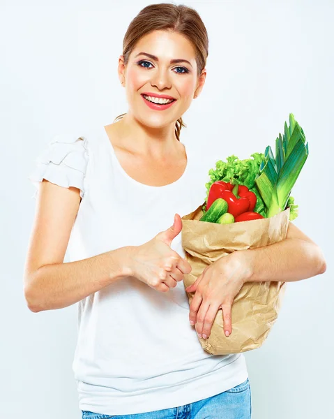 Lachende vrouw houd groene voedsel. — Stockfoto