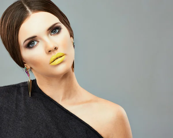 Beautiful woman with yellow lips — Stock Photo, Image