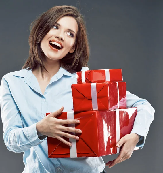 Young woman holding red gift box. — Stock Photo, Image