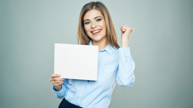 Business woman holds white board