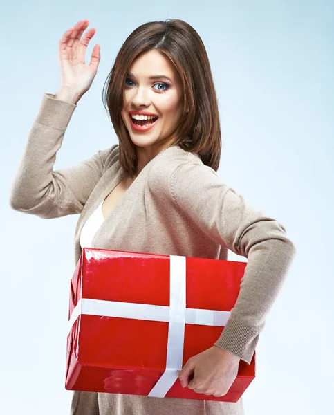 Happy woman holds gift box — Stock Photo, Image