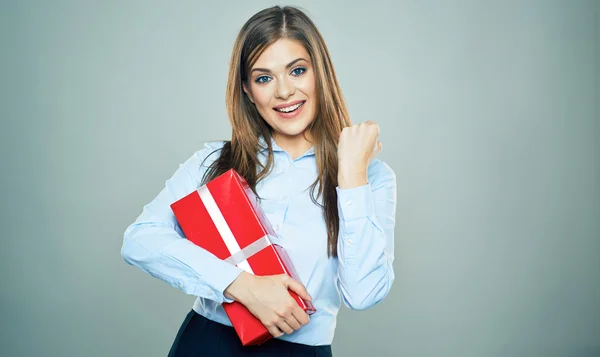 Business woman holding gift box — Stock Photo, Image