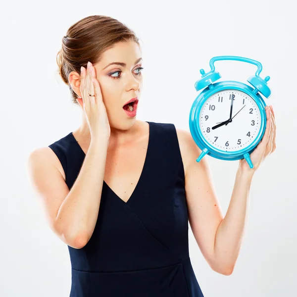 Surprising businesswoman holds watch — Stock Photo, Image