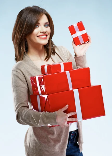 Woman holds red gift boxes — Stock Photo, Image