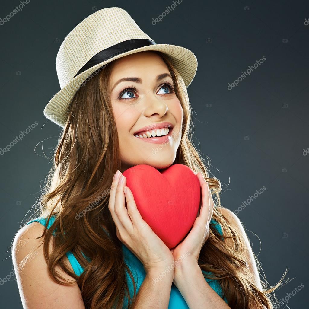 Woman holds red heart — Stock Photo © sheftsoff 60940169