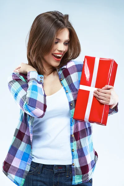 Woman holds red gift box — Stock Photo, Image