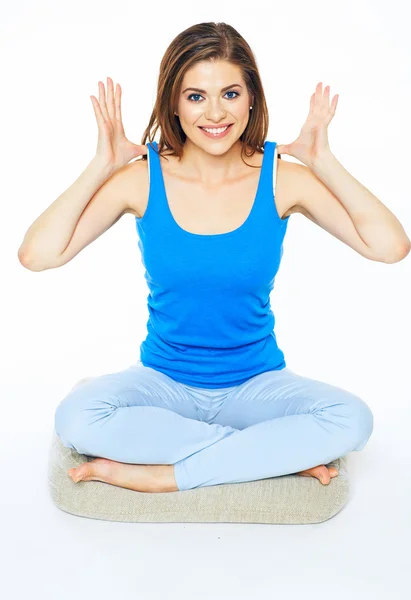 Woman sitting in yoga pose — Stock Photo, Image